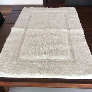 White thick bath mat, 21 x 35”